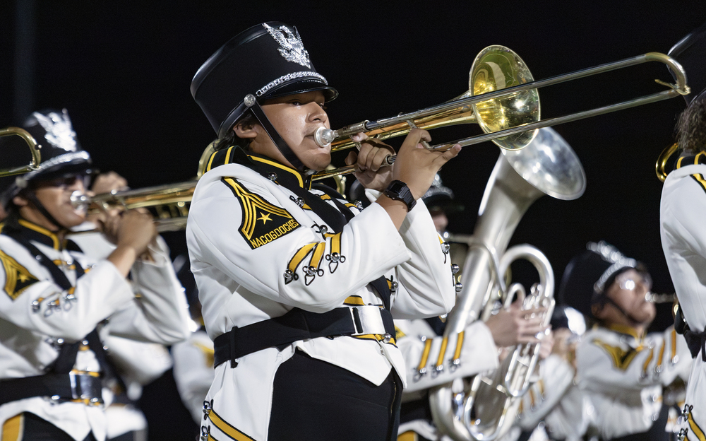 Band member performs on trombone