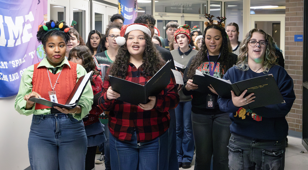 High school choir sings Christmas carols