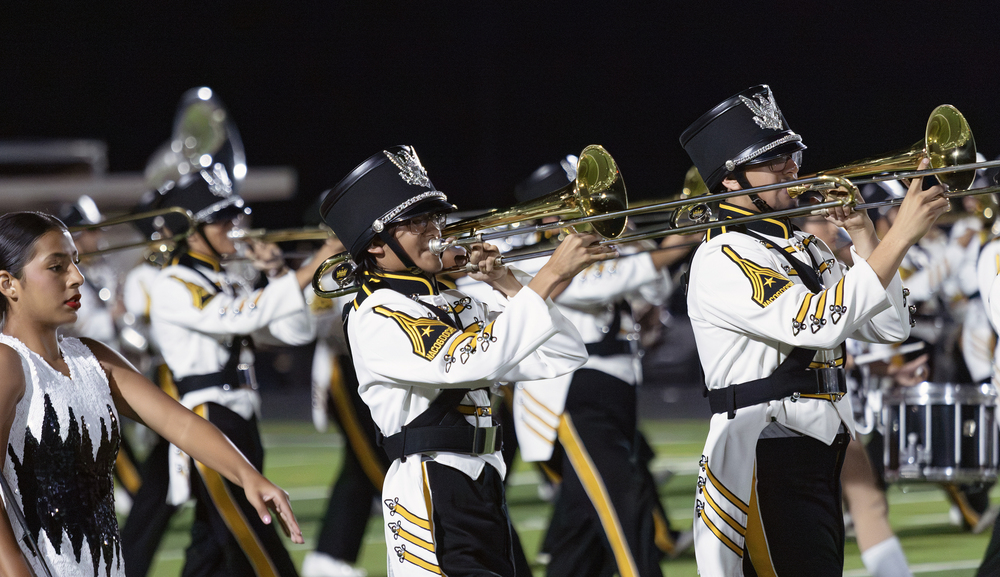 Nacogdoches band members march on field
