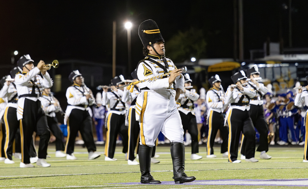 Dragon drum major leads band