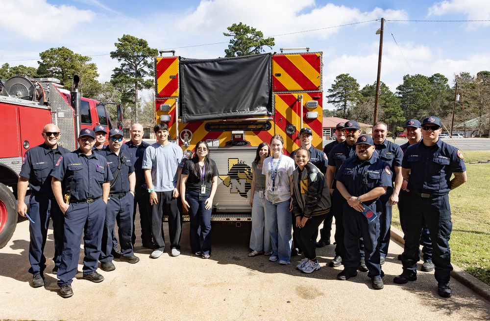 Nacogdoches High School students and firefighters