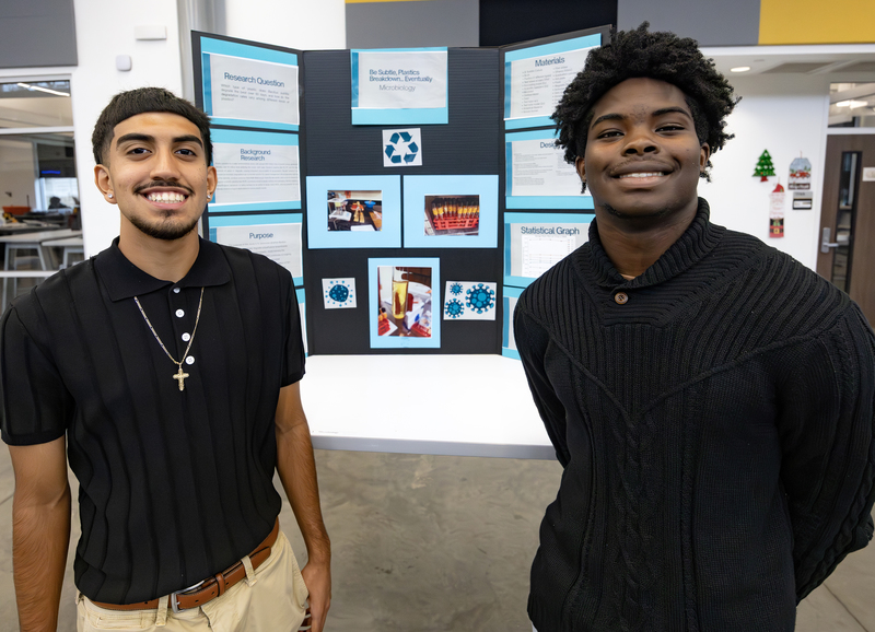 Students in front of project