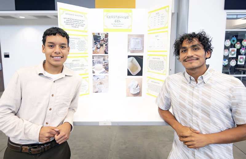Students in front of project