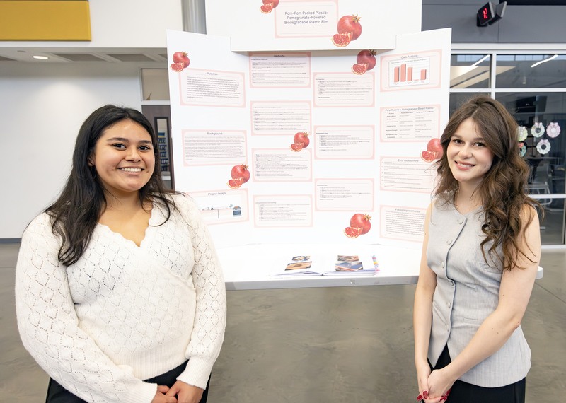 Students in front of project