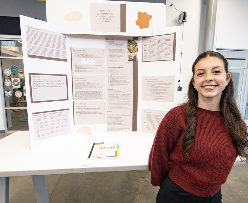 Students in front of project