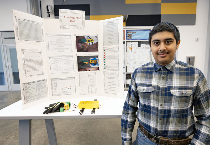 Students in front of project
