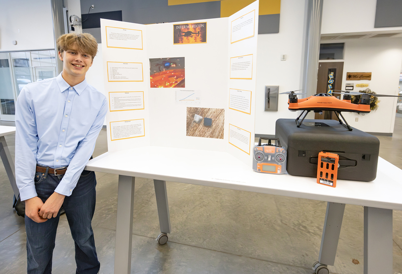 Students in front of project