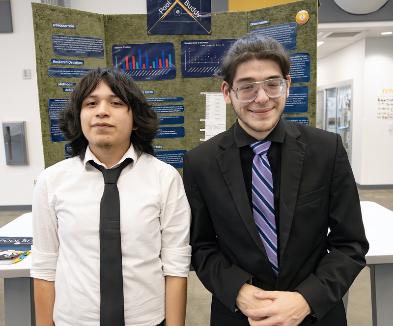 Students in front of project