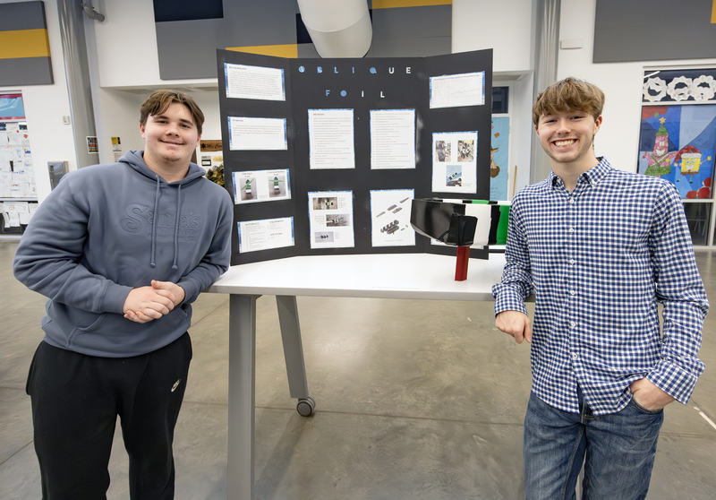 Students in front of project