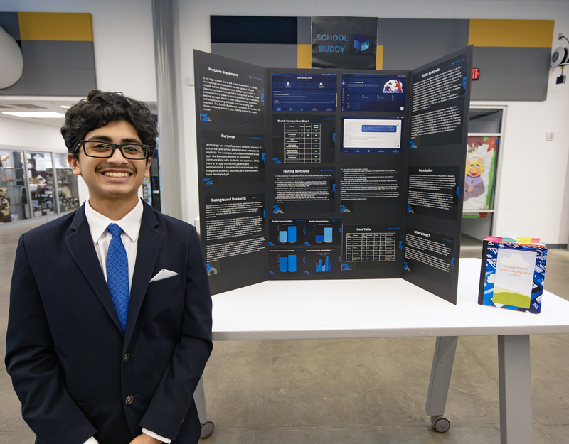 Students in front of project