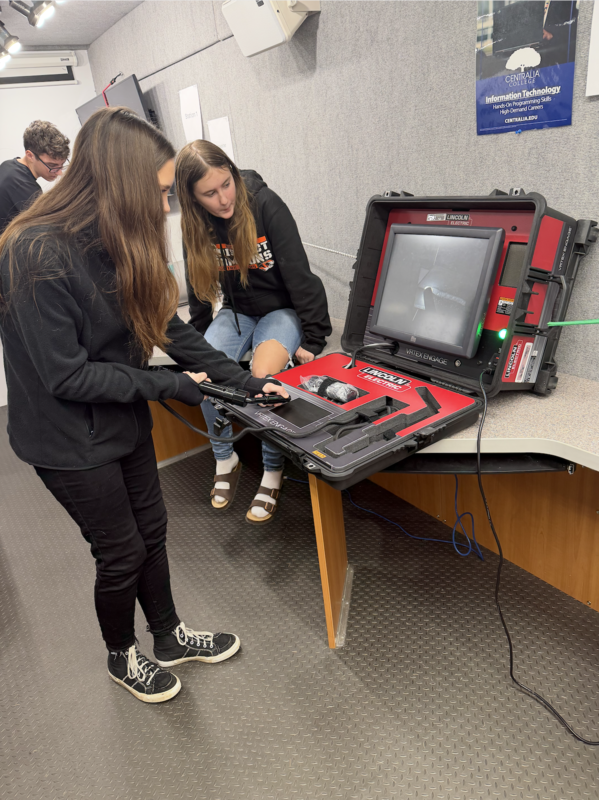 8th grade girls get to try the welder simulator