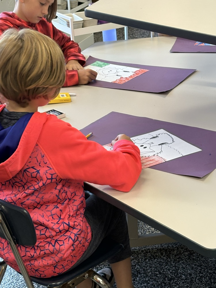 student doing artwork 