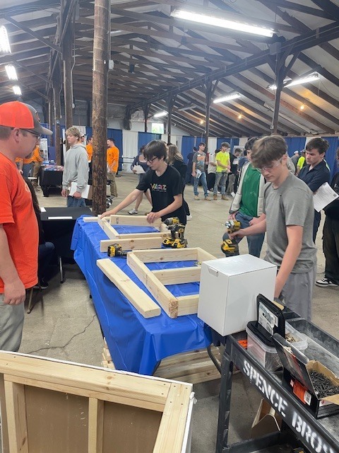 Ackerson High School students engaging in hands on activities in the skilled trade apprenticeship programs, watched industry professionals like architects and engineers in action, and connected with representatives from construction firms, educational institutions, and industry organizations.