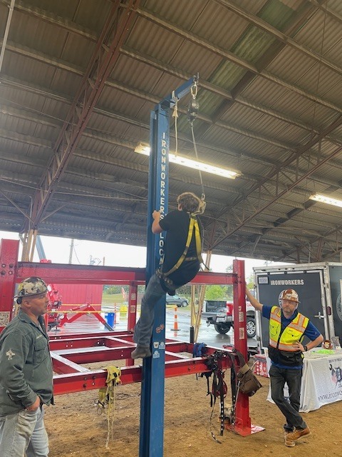 Ackerson High School students engaging in hands on activities in the skilled trade apprenticeship programs, watched industry professionals like architects and engineers in action, and connected with representatives from construction firms, educational institutions, and industry organizations.