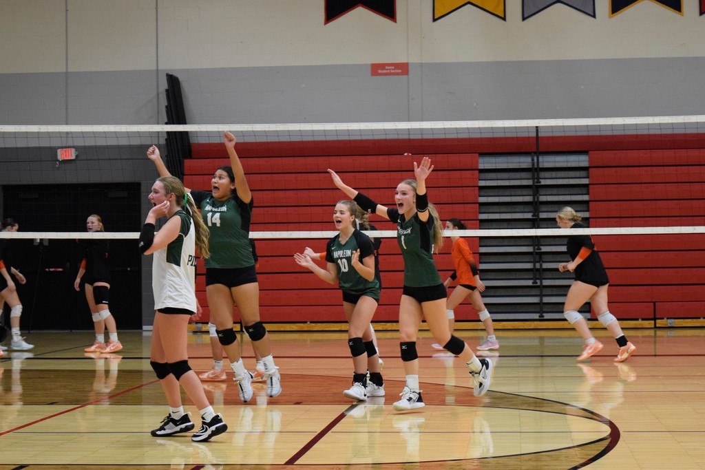 Napoleon Volleyball celebrates winning a set