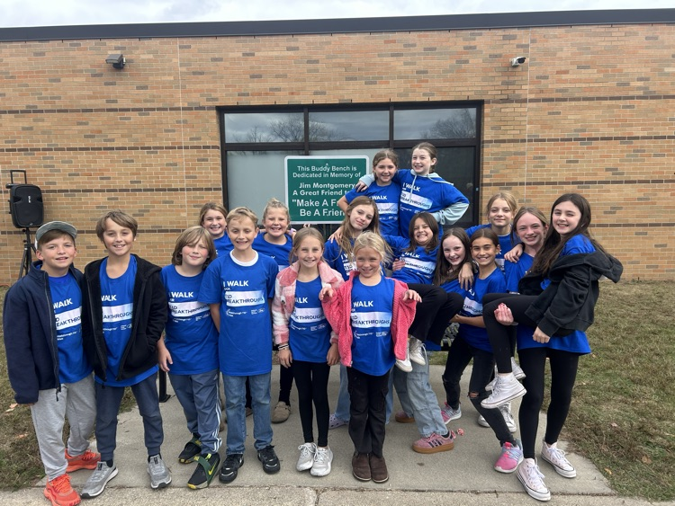 kids standing in front of the school