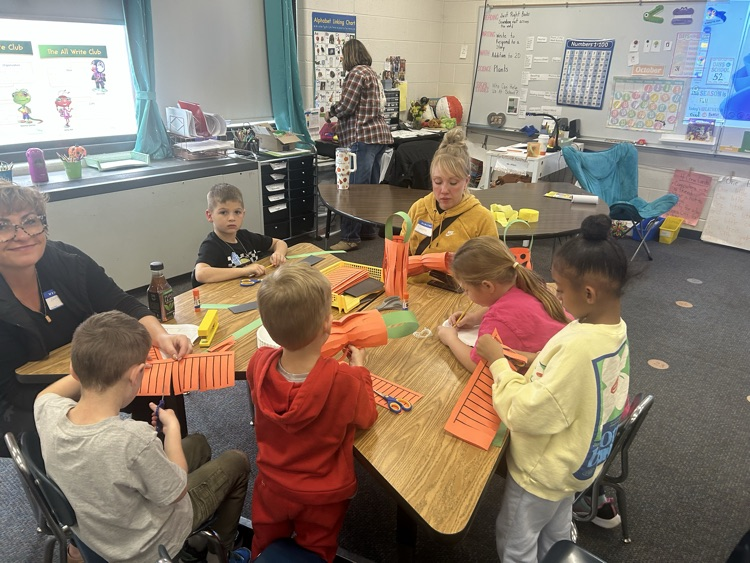 students making a pumpkin lantern