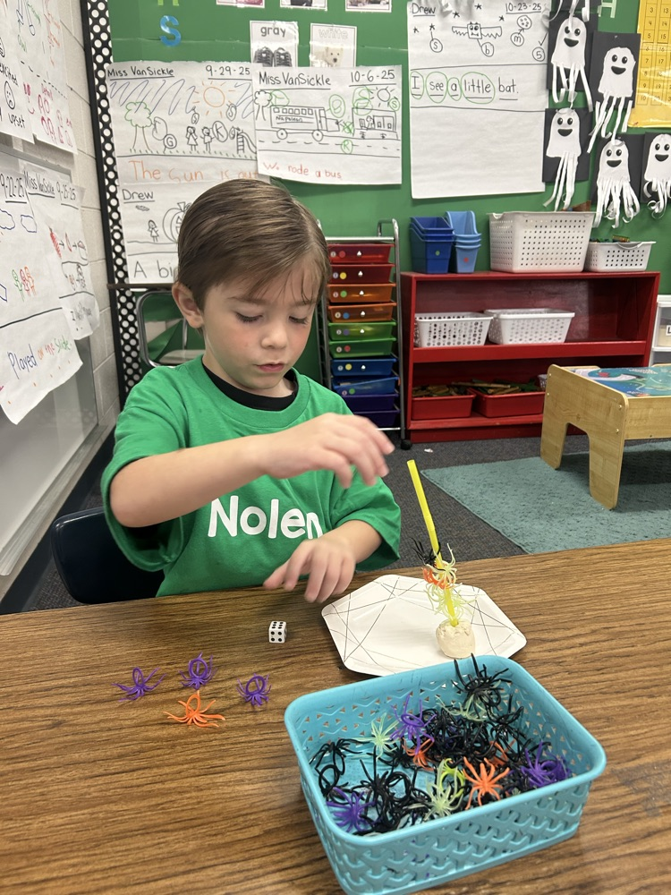 student building a spider tower