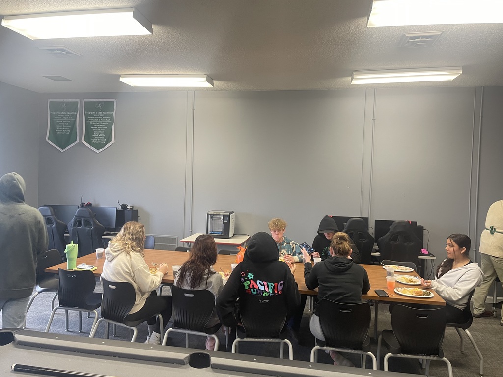 Students sit down and enjoy the feast!