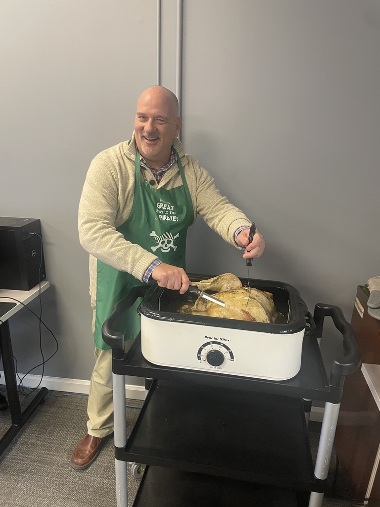 Mr. O'Leary carving the turkey.