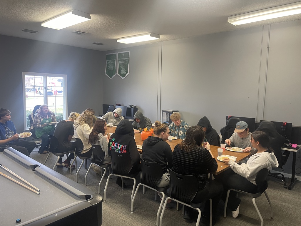 Students sit down and enjoy the feast!