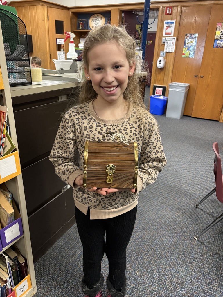 girl holding a treasure chest 