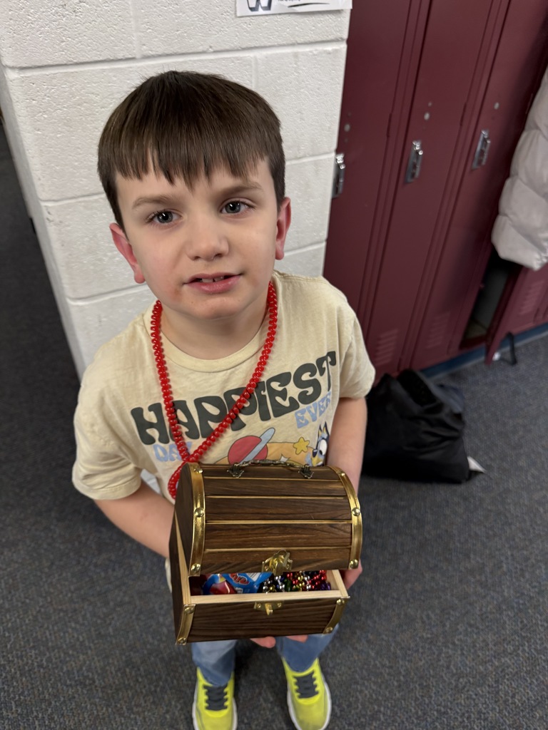 boy holding a treasure chest 