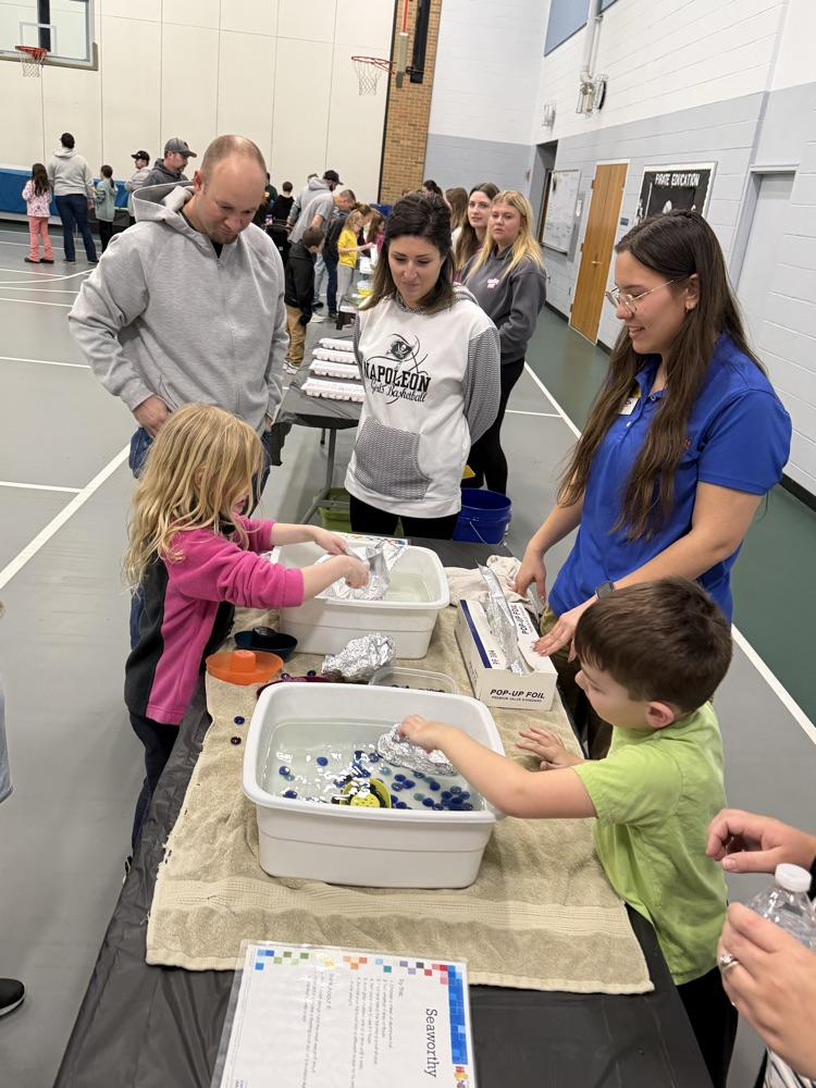 children playing in tubs