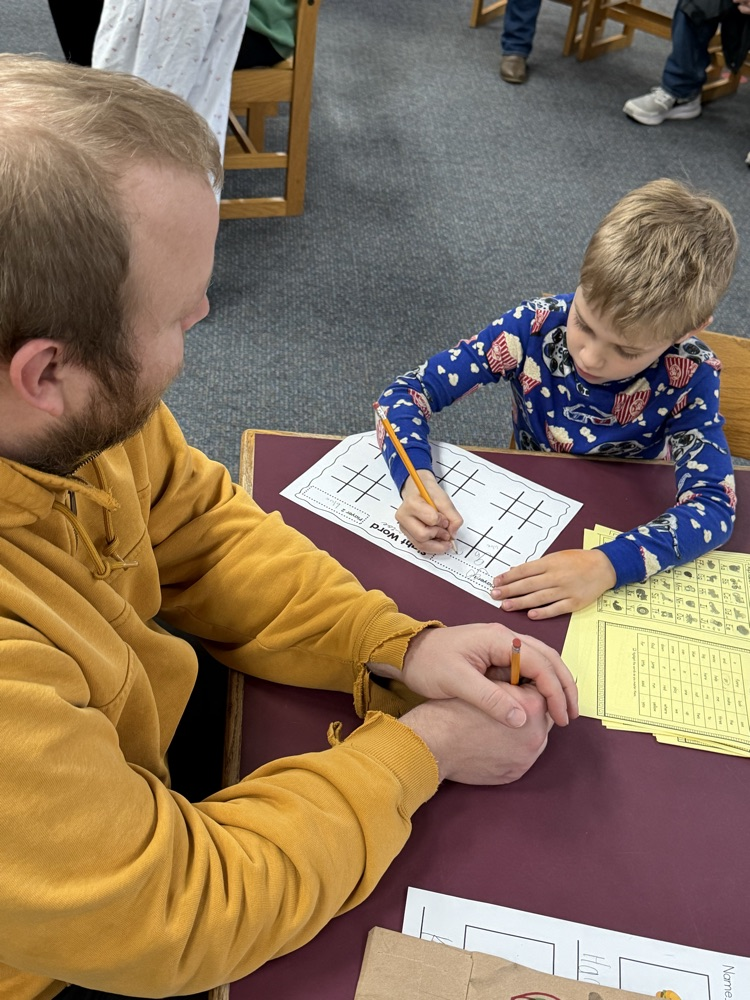 dad and son at table
