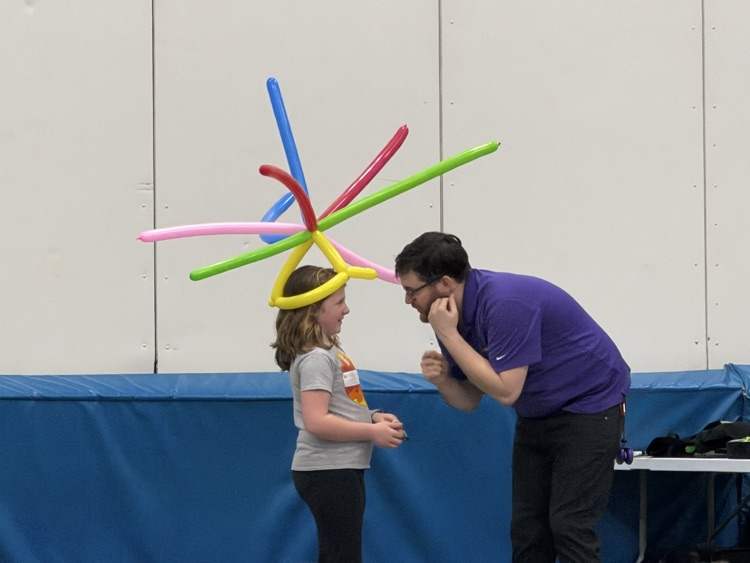 student and NED yoyo presenter