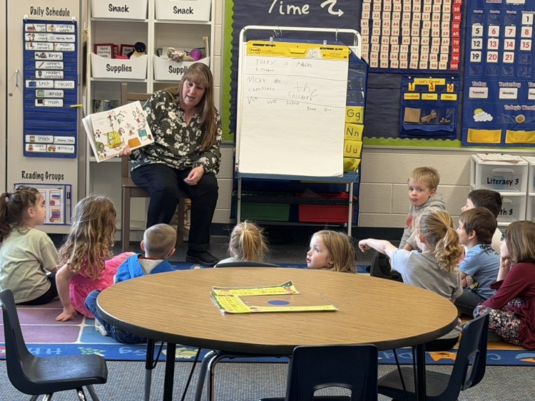 students being read to on the carpet