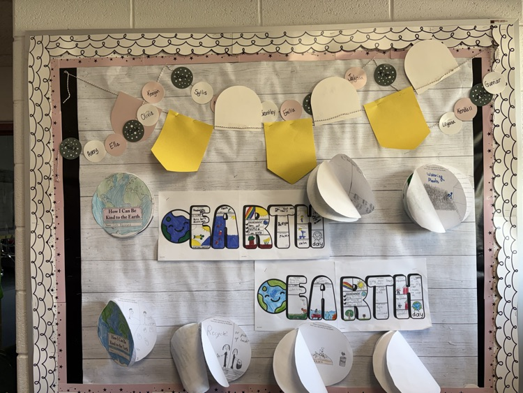 earth day artwork on bulletin board
