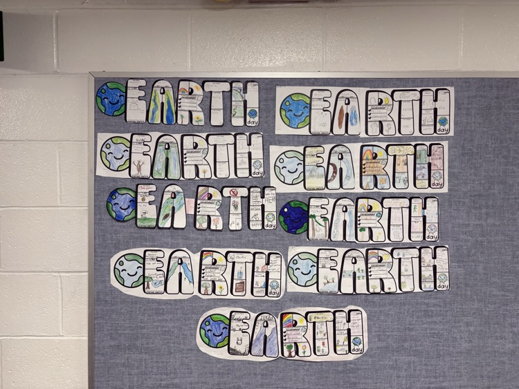 earth day artwork on bulletin board