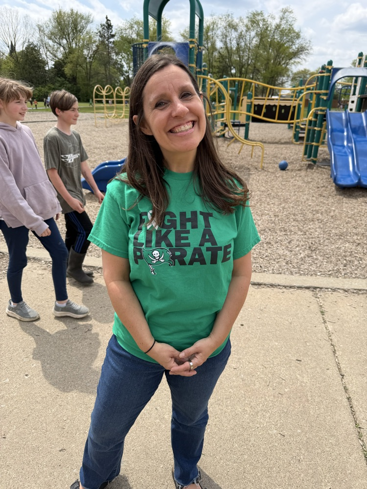 woman wearing fight cancer shirt standing on playground 