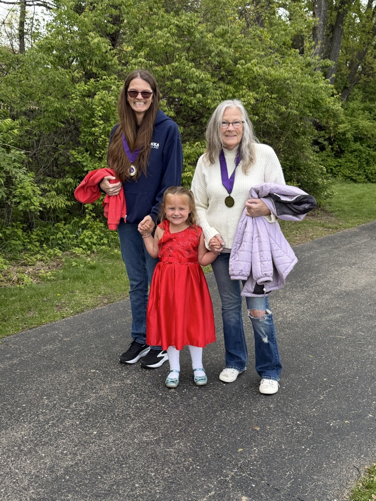 adults and child on track
