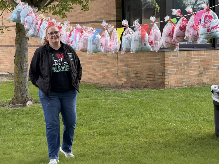 woman standing by string of cotton candy