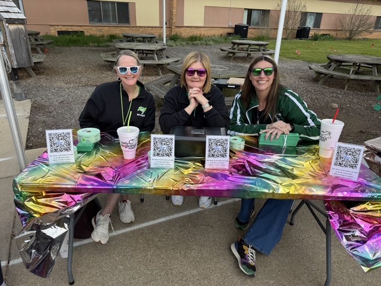 three women sitting at table
