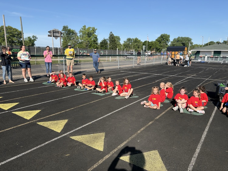 kids sitting on the track