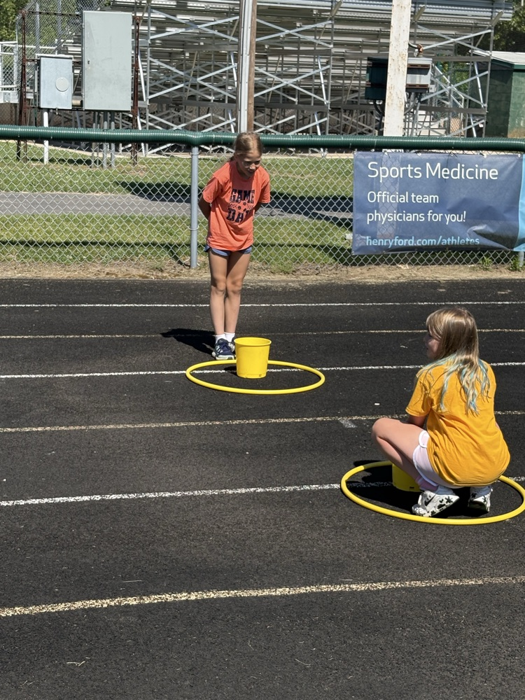 students playing game on track