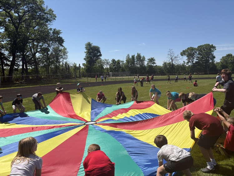 kids playing with parachute