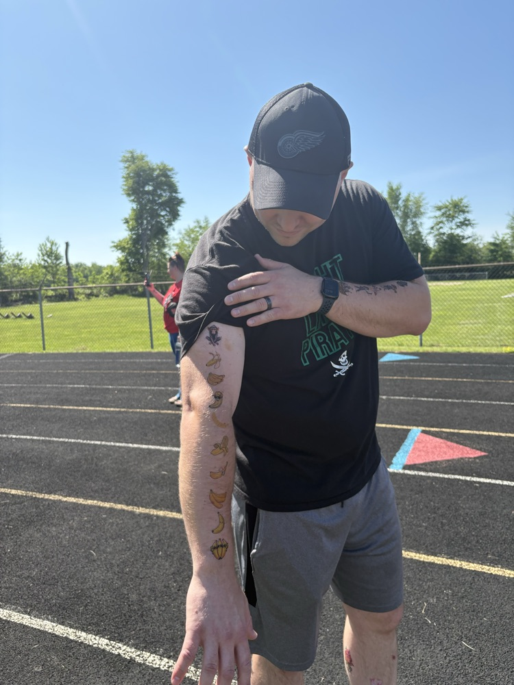 man showing tattoos