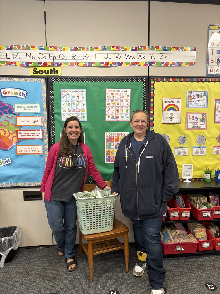 two women in a classroom with a basket