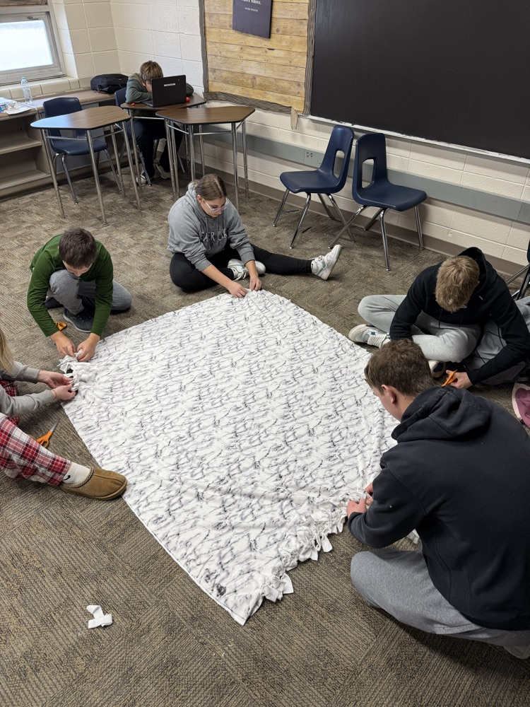 kids making the blankets