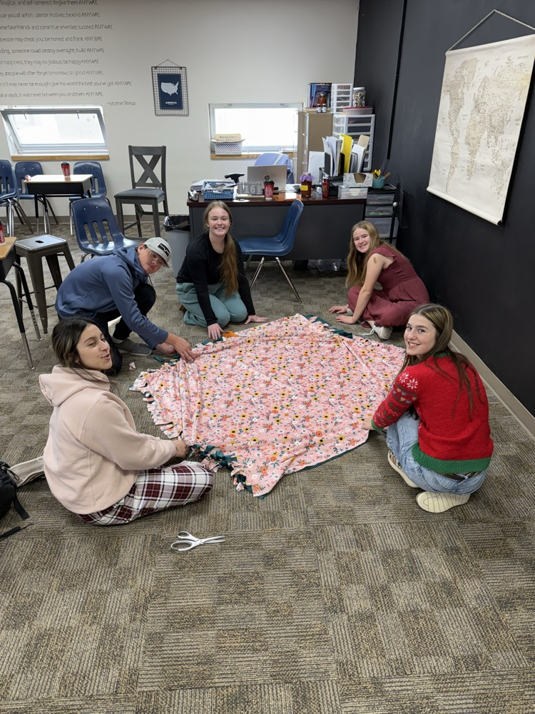 kids making the blankets