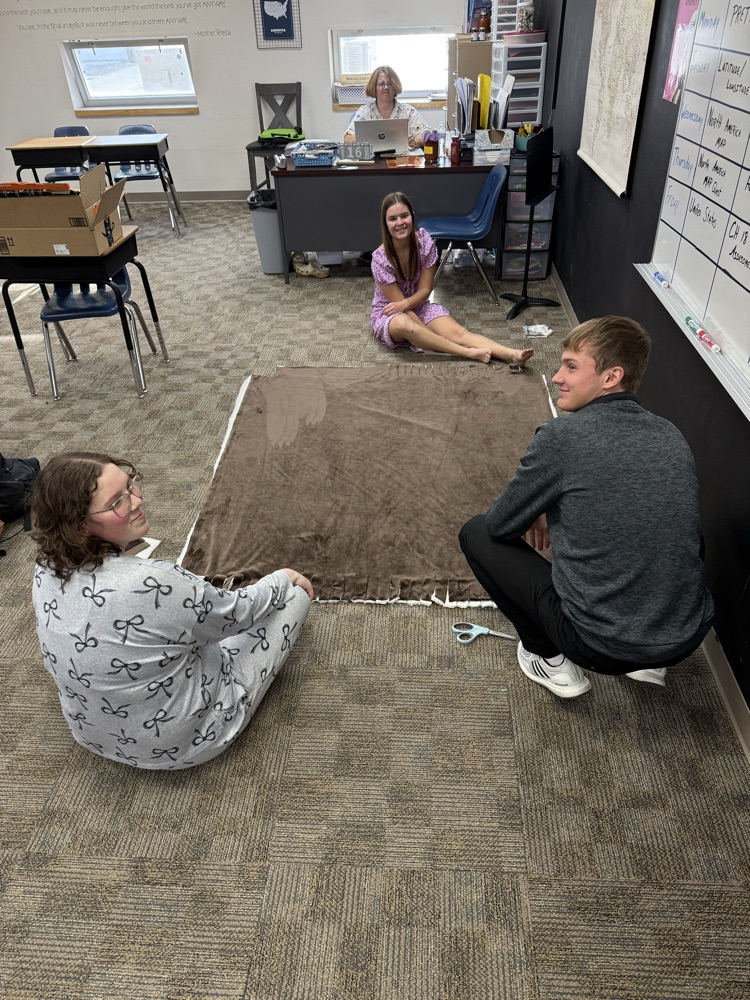 kids making the blankets