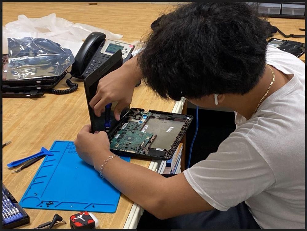 Student working at help desk
