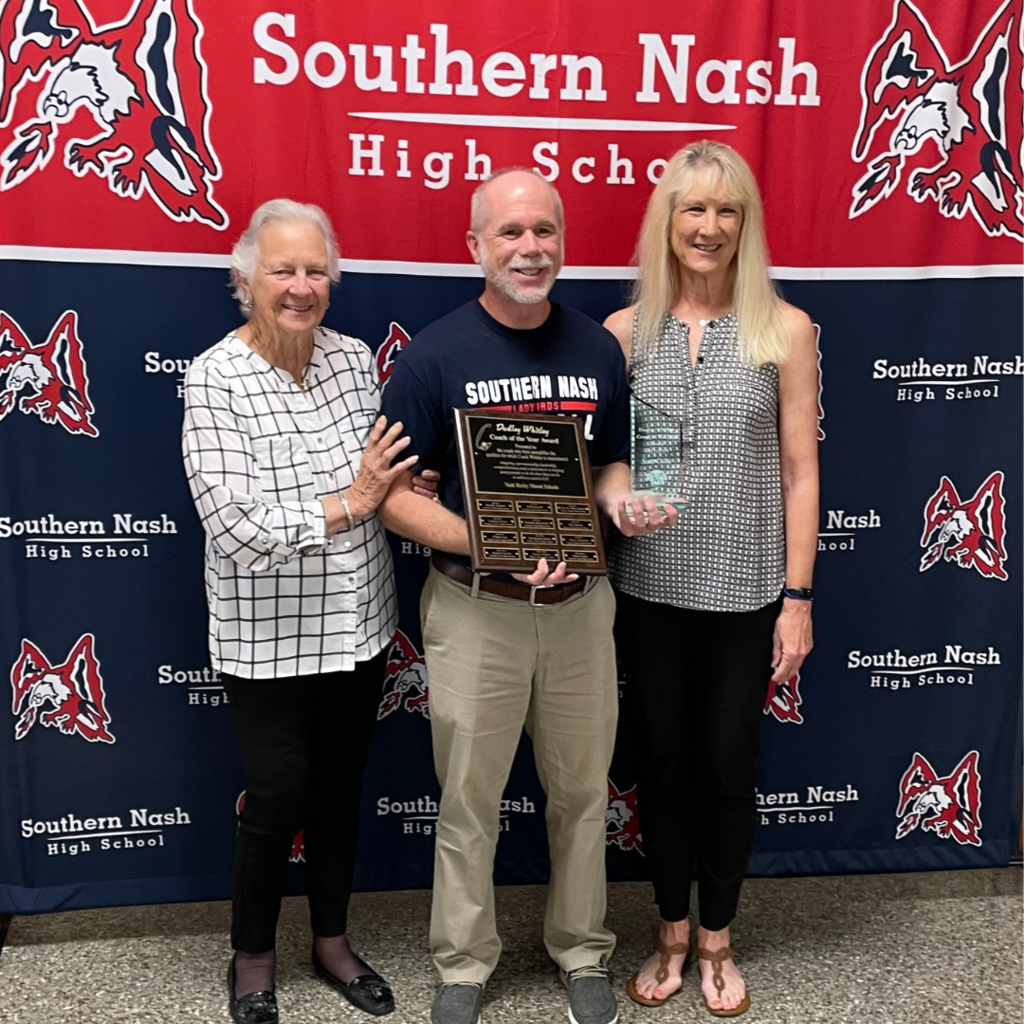 Coach Scott Collie getting the Dudley Whitley Award