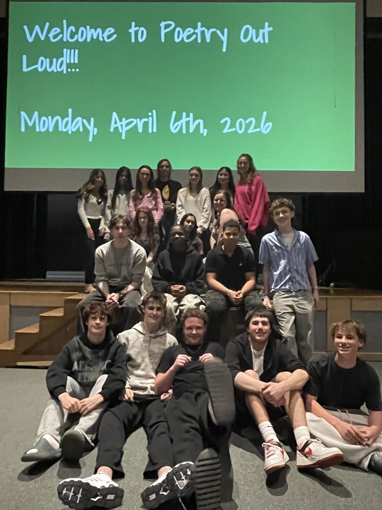 Poetry Out Loud competition finalists pose together in the NRHS auditorium.