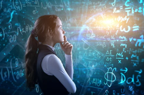 A girl stands a looks at a glowing chalkboard.