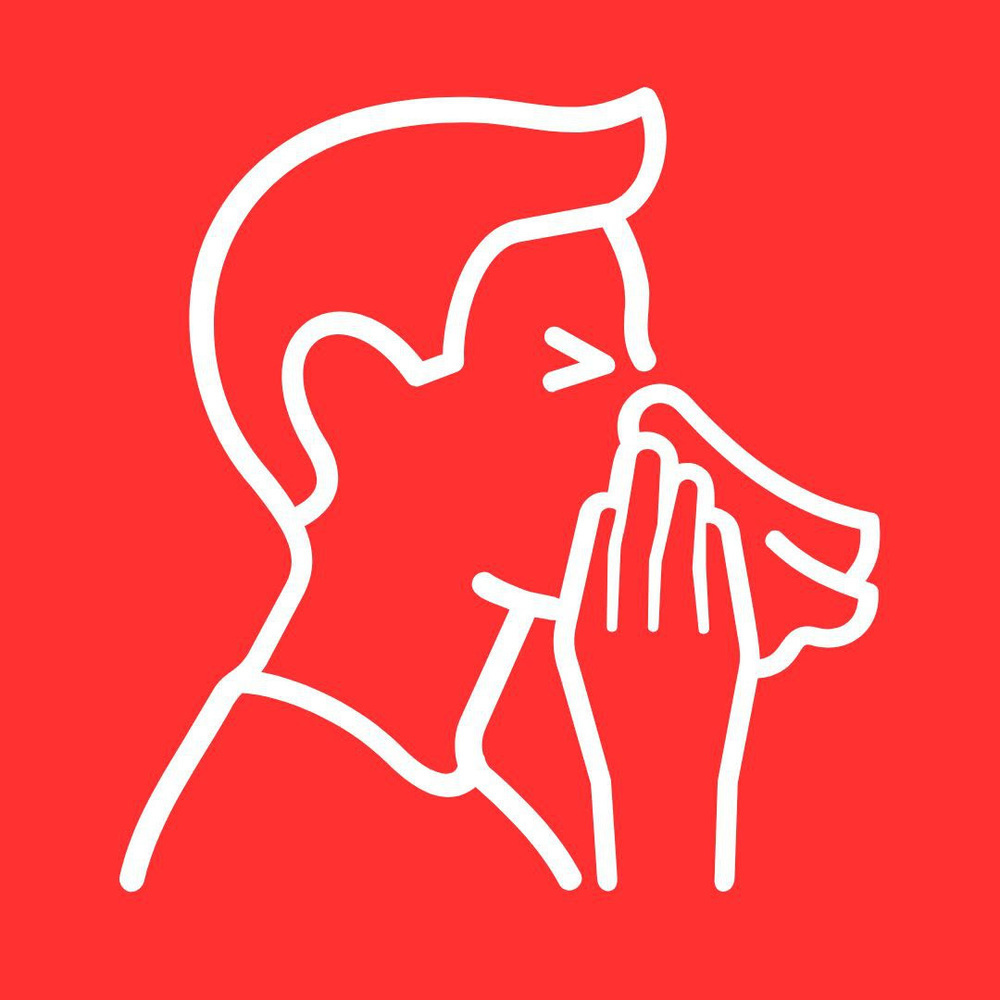 Man sneezing into a tissue.